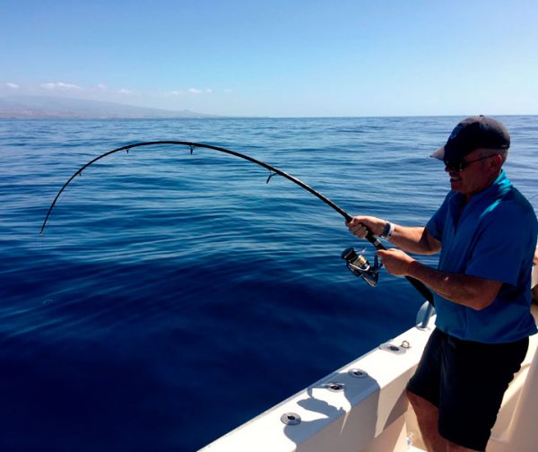 Man fishing blue merlin